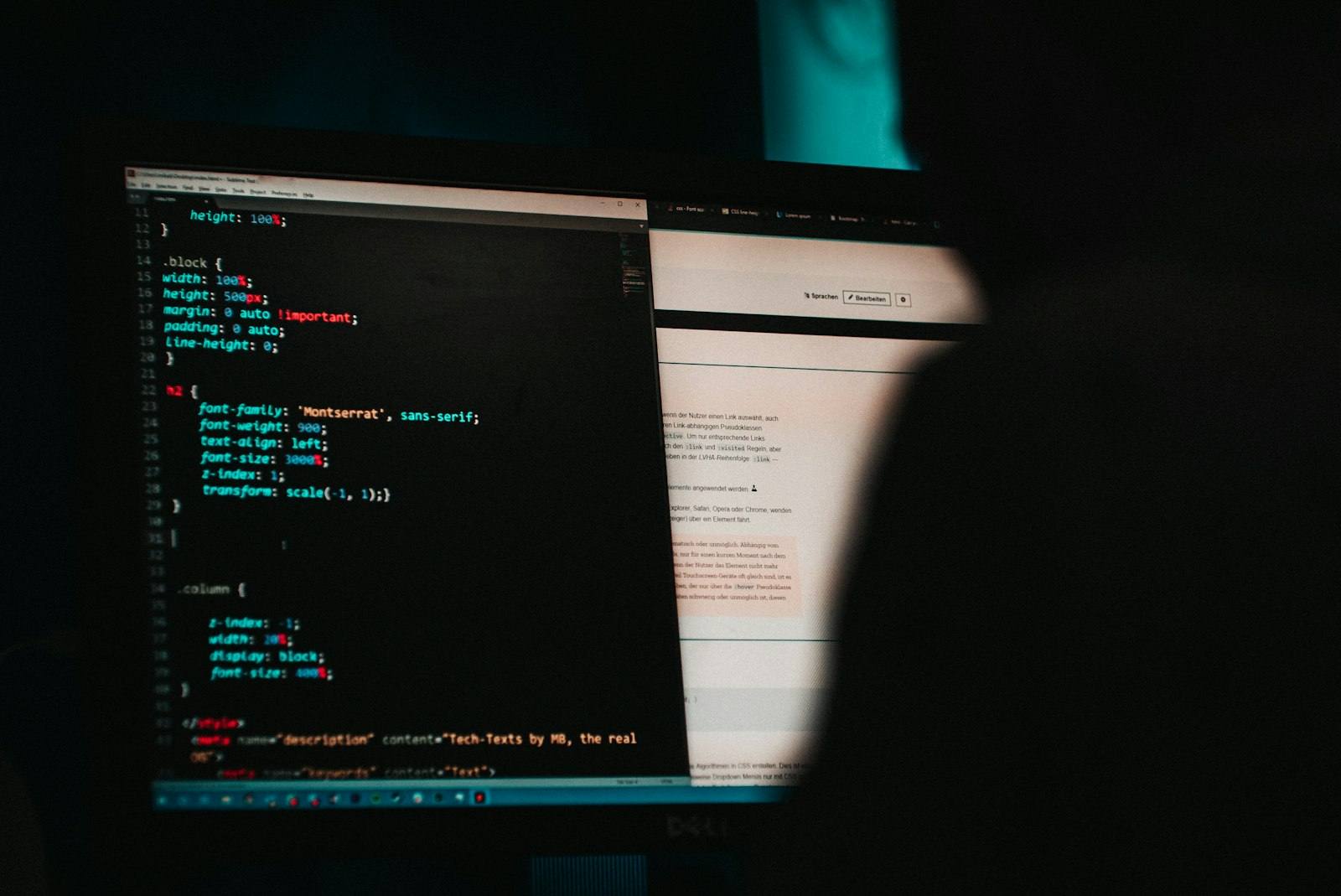Source code on a dark screen in a dim room